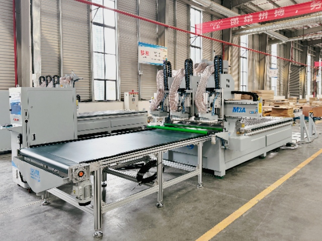M3-12 CNC Router With Three Main Spindles And A Linear 12-Tool Magazine